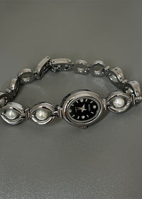 Silver Strap Black Surface