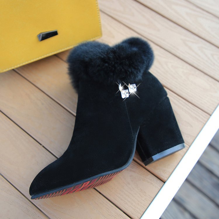 Martens boots with large pointed rhinestones