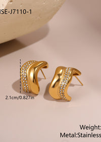 gold curve earrings