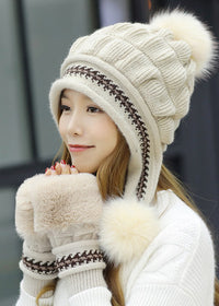 With gloves