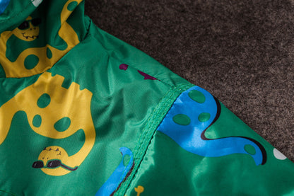 The Jurassic Shield: Cute Dinosaur Windproof & Rainproof Jacket