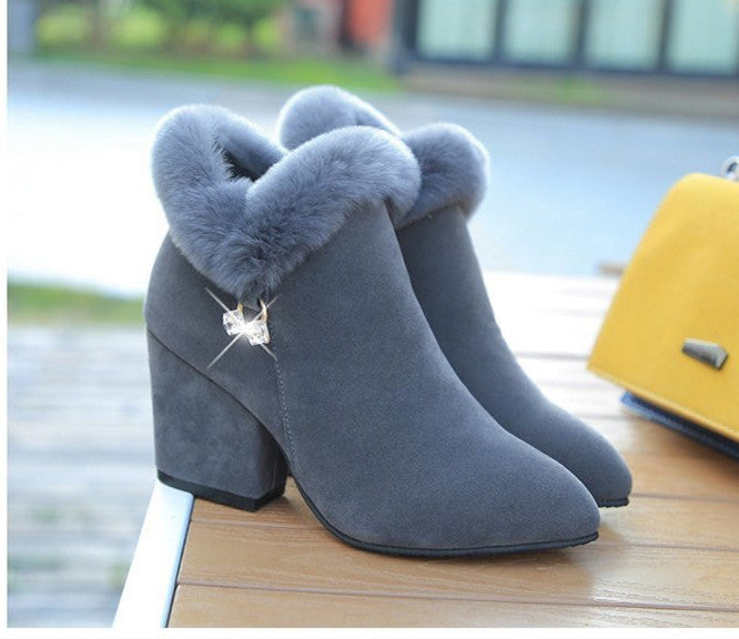 Martens boots with large pointed rhinestones