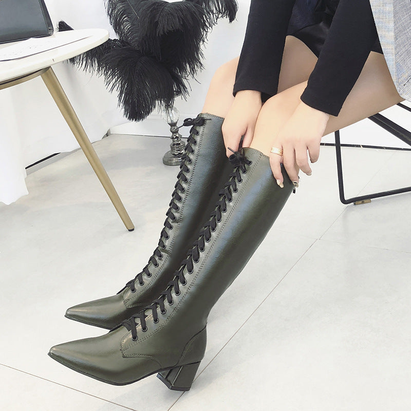 Cross lace pointed toe boots