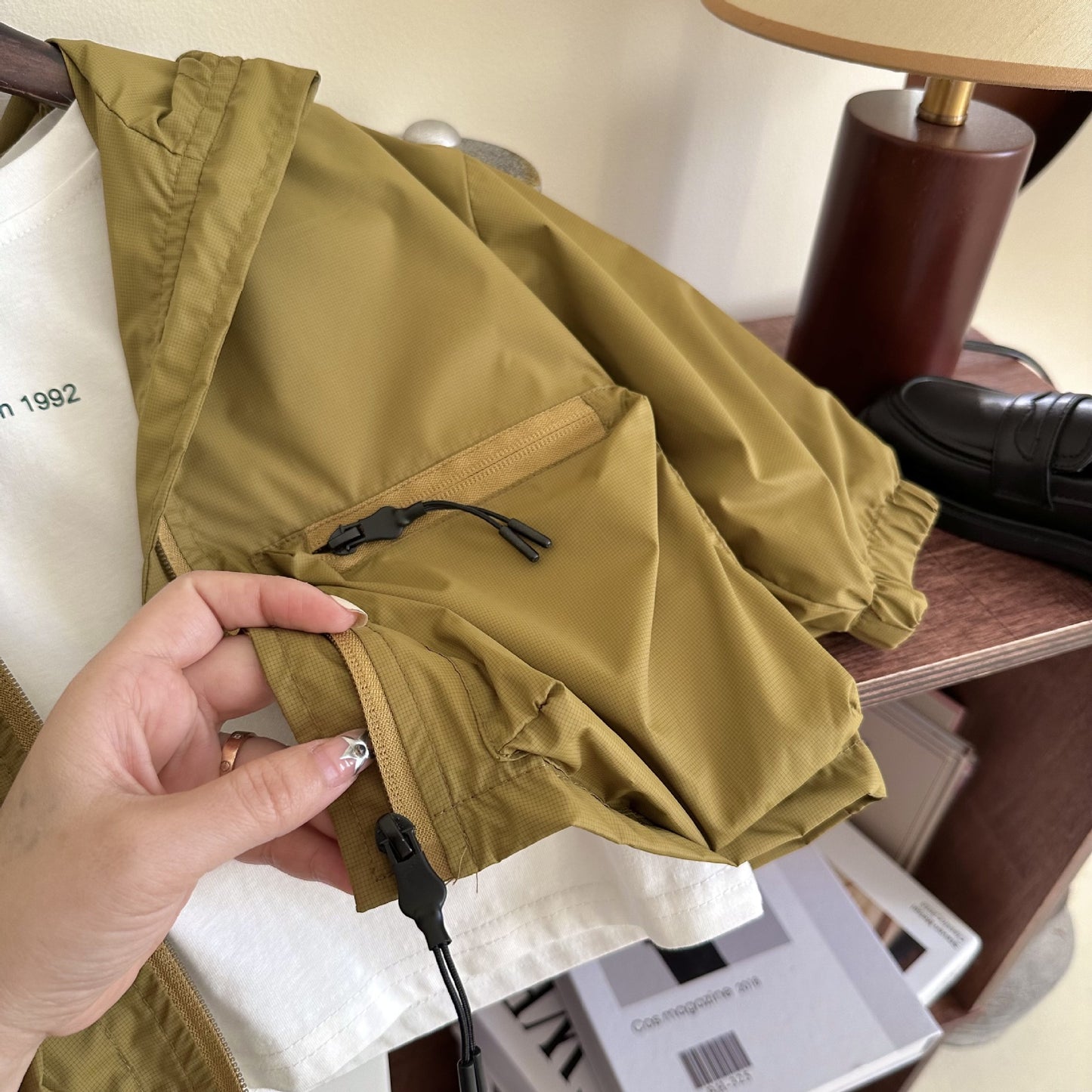 The Minimal Shell: Solid-Color Short Hooded Shell Jacket