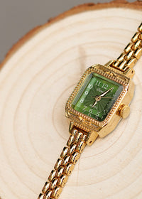 Green Surface Gold Strap